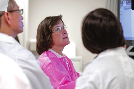 Susan Dawson working alongside laboratory colleagues